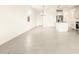 Spacious living room with tile floors open to the kitchen at 2673 E San Miguel Dr, Casa Grande, AZ 85194