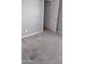 Carpeted bedroom with light gray walls, white trim, and a closet at 374 S Verdad Ln, Casa Grande, AZ 85194