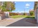 Enjoy this backyard with a large patio area, grassy space, and mature trees, perfect for outdoor living at 416 W Chambers St, Phoenix, AZ 85041