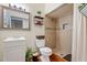 Bathroom featuring a vanity, toilet and shower stall with tan tile at 416 W Chambers St, Phoenix, AZ 85041