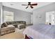 View of bedroom with fan, carpet, and seating area at 42823 N Courage Trl, Anthem, AZ 85086