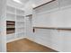 Walk-in closet with shelves and rods at 42823 N Courage Trl, Anthem, AZ 85086