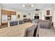 The living room flows into the dining area and kitchen, creating an open and inviting living space at 42823 N Courage Trl, Anthem, AZ 85086