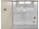 Clean, bright glass-enclosed shower with gold fixtures at 42823 N Courage Trl, Anthem, AZ 85086