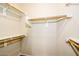 Well-organized closet with multiple shelves and rods, providing ample storage space at 45049 W Cypress Ln, Maricopa, AZ 85139