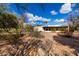 Wide backyard with a stucco exterior and desert landscaping at 4621 E Onyx Ave, Phoenix, AZ 85028