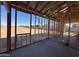 Framing allows the home builder to add windows and begin to enclose this construction project that will be someones dream home at 47733 W Kenner Dr, Maricopa, AZ 85139