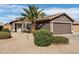 Charming single-story home with a well-manicured desert landscape and a mature palm tree at 48 E Nolana Pl, San Tan Valley, AZ 85143