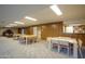 Simple dining area with multiple tables and ample lighting at 4808 N 24Th St # 908, Phoenix, AZ 85016