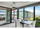 Dining area with modern table and chairs near a sliding door to a private balcony at 4808 N 24Th St # 908, Phoenix, AZ 85016