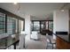 Bright living room and dining area features floor-to-ceiling windows with city views at 4808 N 24Th St # 908, Phoenix, AZ 85016