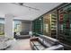 Sophisticated living room with plush seating and expansive windows offering city views at 4808 N 24Th St # 908, Phoenix, AZ 85016