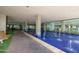 The building lobby features a tranquil indoor water feature, bench seating, and natural lighting at 4808 N 24Th St # 908, Phoenix, AZ 85016