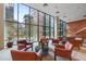 Bright lounge area features several chairs, large windows, and natural lighting at 4808 N 24Th St # 908, Phoenix, AZ 85016