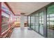 Spacious enclosed patio boasts city views from multiple sliding glass doors at 4808 N 24Th St # 908, Phoenix, AZ 85016
