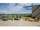 Relax on this rooftop deck with stainless steel grills, tile floors, synthetic grass, and mountain views at 4808 N 24Th St # 908, Phoenix, AZ 85016