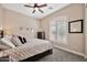 Bright bedroom with shuttered window provides natural light and enhances privacy at 4944 E Dale Ln, Cave Creek, AZ 85331