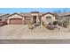 Charming single-story home featuring desert landscaping, a two-car garage, and a covered front entry at 4944 E Dale Ln, Cave Creek, AZ 85331