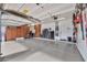 Spacious garage with epoxy flooring and custom cabinets offers abundant storage at 4944 E Dale Ln, Cave Creek, AZ 85331