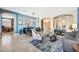 Bright open-concept living room with tile floors, accent walls, and comfortable furnishings at 4944 E Dale Ln, Cave Creek, AZ 85331
