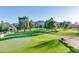 Lush green golf course with mature trees and mountain views provides a scenic backdrop for this beautiful property at 576 W Moon Valley Dr, Phoenix, AZ 85023