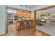 Stylish kitchen with breakfast bar and open layout to dining area, perfect for entertaining at 576 W Moon Valley Dr, Phoenix, AZ 85023