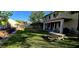 Enjoy this peaceful backyard with green grass, picnic table and patio area at 5924 W Running Deer Trl, Phoenix, AZ 85083