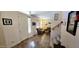 Inviting entryway featuring tile floors, a staircase, and a view into the cozy living room at 5924 W Running Deer Trl, Phoenix, AZ 85083