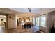 Open-concept kitchen and dining area, showcasing modern appliances, a center island, and plenty of natural light at 5924 W Running Deer Trl, Phoenix, AZ 85083