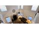 Lofted view of the living room with tall ceilings, a ceiling fan, and large windows that allow for ample natural light at 5924 W Running Deer Trl, Phoenix, AZ 85083