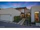 Beautiful home with a modern design, desert landscaping and a spacious garage at 5935 N Echo Canyon Ln, Phoenix, AZ 85018