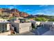 Stunning contemporary home featuring a rooftop deck, mountain views, and a three-car garage at 5935 N Echo Canyon Ln, Phoenix, AZ 85018