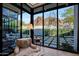 Sunroom featuring comfortable seating and beautiful views of the landscape at 5935 N Echo Canyon Ln, Phoenix, AZ 85018