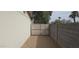 Gated side yard area providing secure access and potential storage at 714 N 96Th St, Mesa, AZ 85207