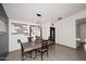 Dining area showcasing modern industrial lighting at 7334 W Sunnyside Dr, Peoria, AZ 85345