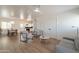 Bright living room with hardwood floors, modern furniture, and an open floor plan at 829 W Mitchell Dr, Phoenix, AZ 85013