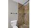 Bathroom shower with elegant marble tiles and a matching marble tiled shower floor at 8522 E Montebello Ave, Scottsdale, AZ 85250