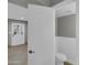 Bathroom with gray walls, white trim, and a white toilet visible at 8522 E Montebello Ave, Scottsdale, AZ 85250