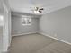 Bedroom with neutral carpeting and a ceiling fan at 8522 E Montebello Ave, Scottsdale, AZ 85250