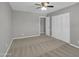 Bedroom featuring neutral walls and carpet, complemented by a ceiling fan at 8522 E Montebello Ave, Scottsdale, AZ 85250