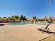 Relaxing community pool area with lounge chairs for residents to enjoy in a well-maintained space at 8522 E Montebello Ave, Scottsdale, AZ 85250