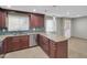 Kitchen featuring granite counters, modern appliances, and ample storage space at 8522 E Montebello Ave, Scottsdale, AZ 85250