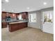 Stylish kitchen with stainless appliances, granite counters, and ample cabinetry at 8522 E Montebello Ave, Scottsdale, AZ 85250