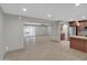 Open-concept living space with tile flooring and seamless flow to the kitchen at 8522 E Montebello Ave, Scottsdale, AZ 85250