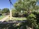 Well-manicured neighborhood with a walking path surrounded by lush landscaping and mature trees at 8522 E Montebello Ave, Scottsdale, AZ 85250