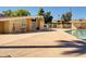 Bright community pool surrounded by lounging area at 8522 E Montebello Ave, Scottsdale, AZ 85250
