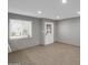Bright room featuring neutral walls, tile flooring, and a large window at 8522 E Montebello Ave, Scottsdale, AZ 85250