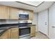 Kitchen showcasing updated appliances, sleek countertops, and ample cabinet space for storage at 8614 N 67Th Dr, Peoria, AZ 85345