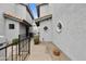 A close view of the landscaped walkway leading to the front door of the townhome at 8614 N 67Th Dr, Peoria, AZ 85345