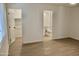 Large main bedroom featuring a walk-in closet and an ensuite bathroom at 9019 W Griswold Rd, Peoria, AZ 85345